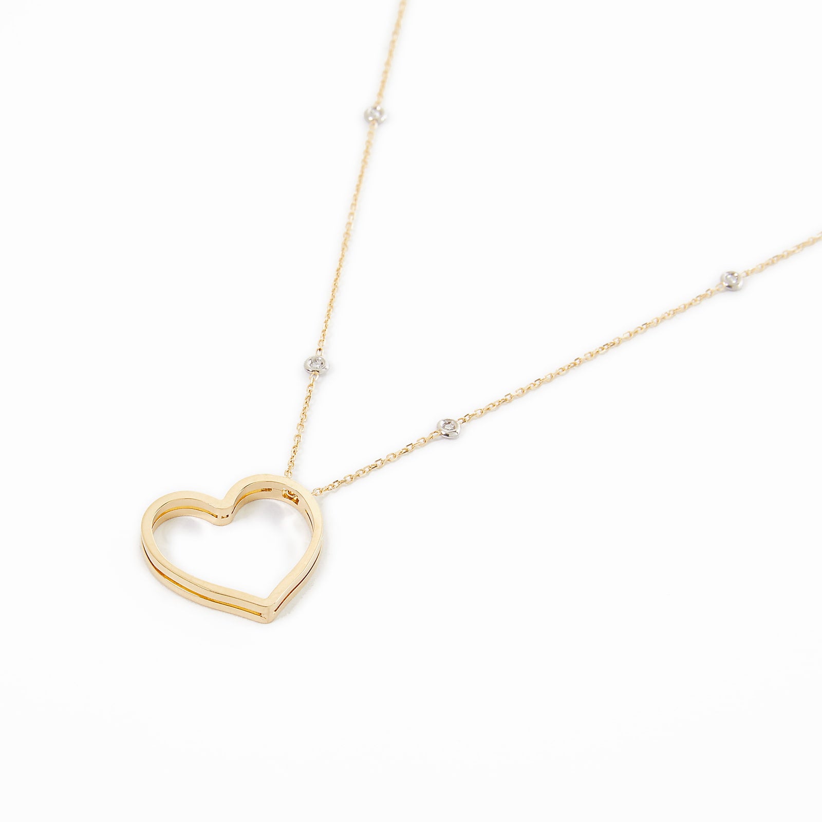 Collana in oro con cuore e diamanti